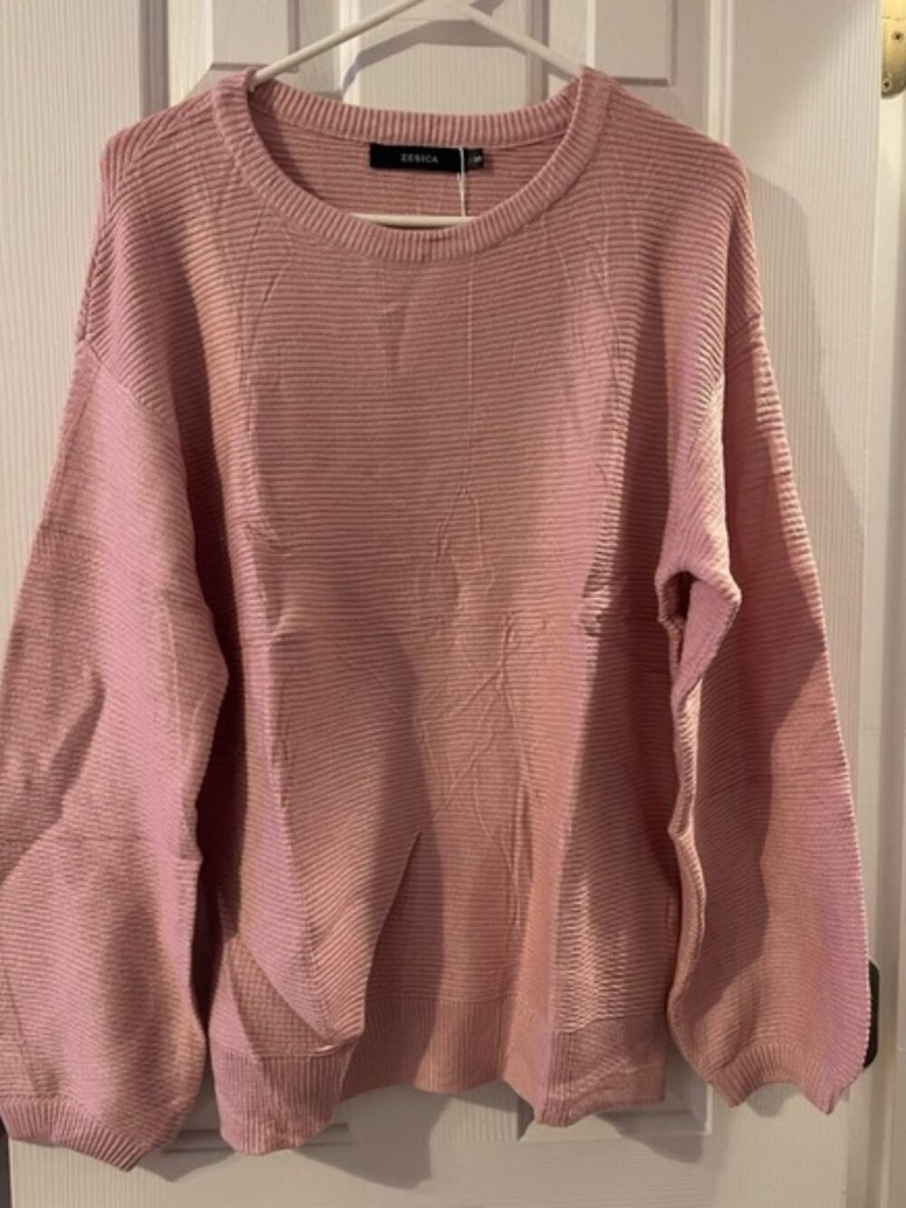 Women’s small pastel pink sweater